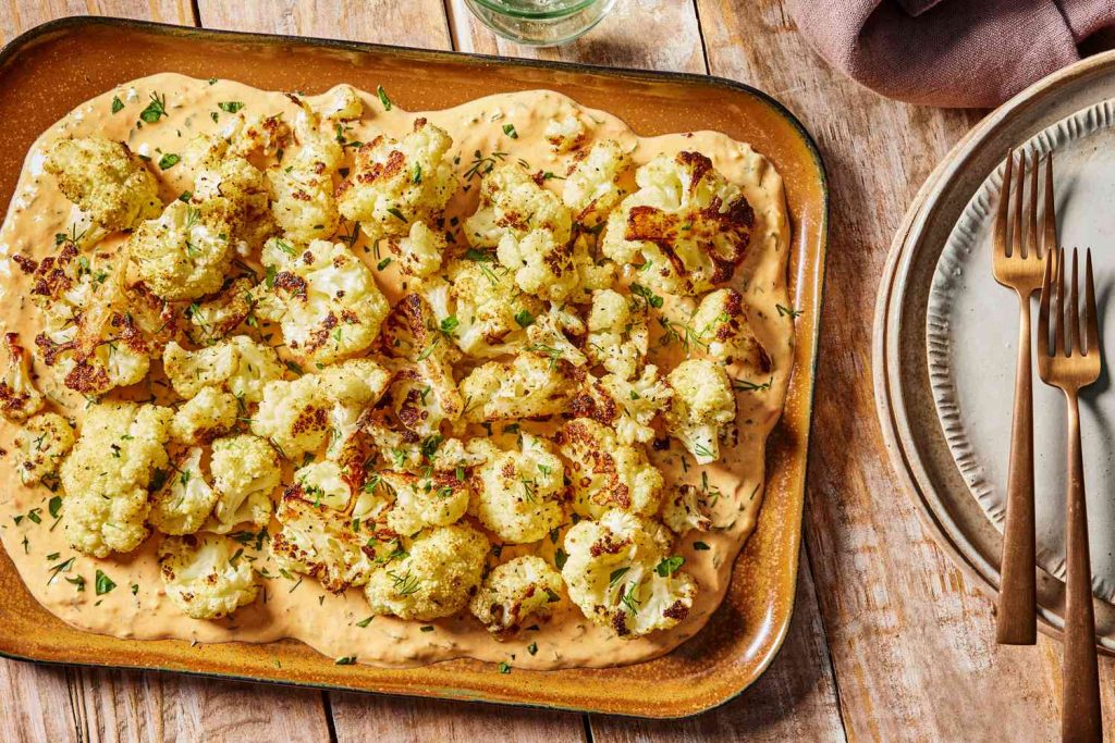 Roasted Cauliflower with Tahini-Yogurt Sauce Is the Stunning Side You Need